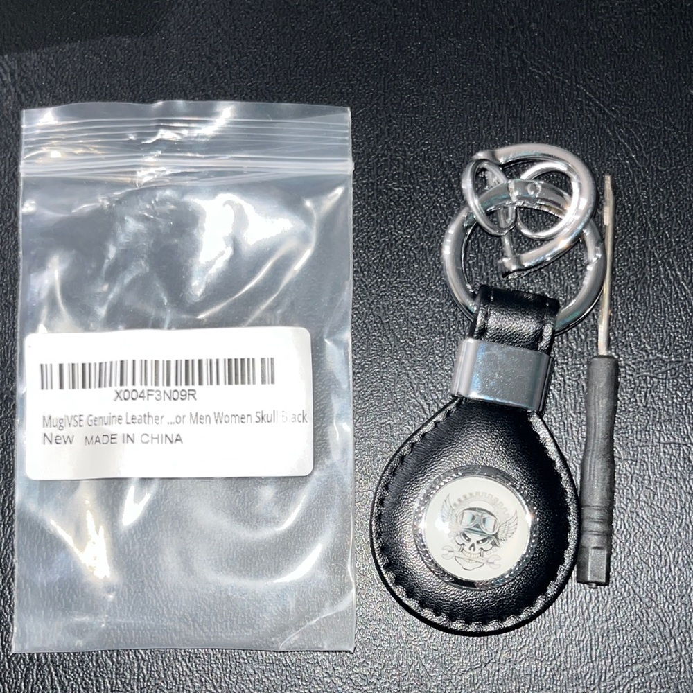 Black Leather Skull Keychain with Silver Accents
